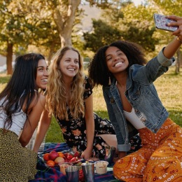 a group of women taking a selfie together