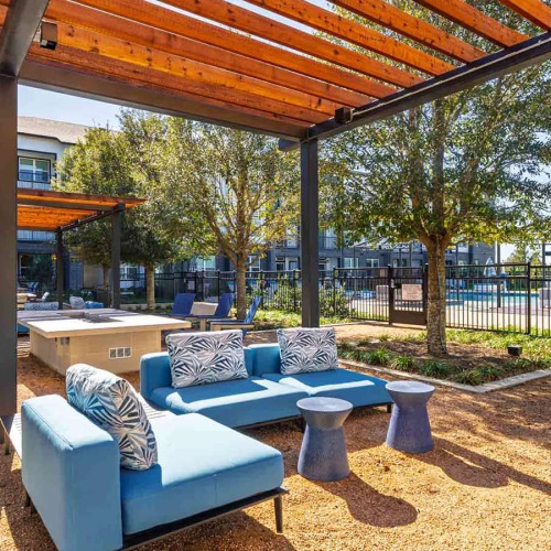 pergola covered sitting areas and fire pit