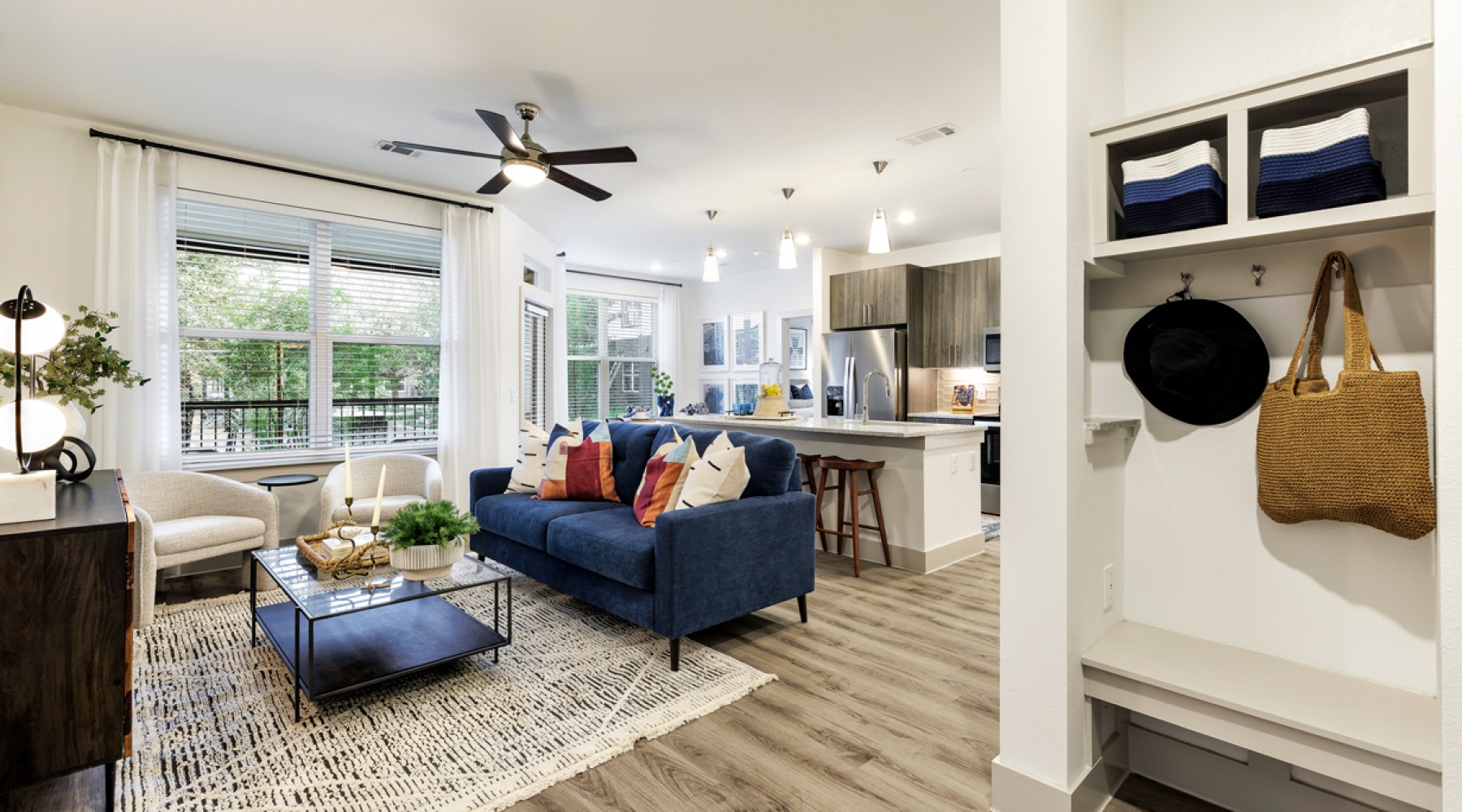 living area  with blue couch 