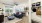 living area with blue couch with open floorplan